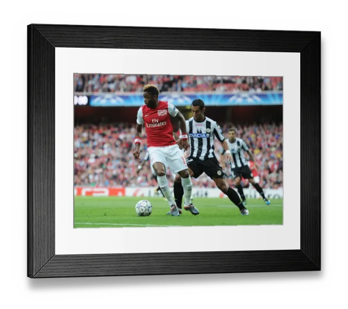 Framed Print : Clash of Midfield Titans: Alex Song vs Medhi Benatia, Arsenal vs Udinese, UEFA Champions League Play-Off, 2011 Framed Print : Clash of Midfield Titans: Alex Song vs Medhi Benatia, Arsenal vs Udinese, UEFA Champions League Play-Off, 2011