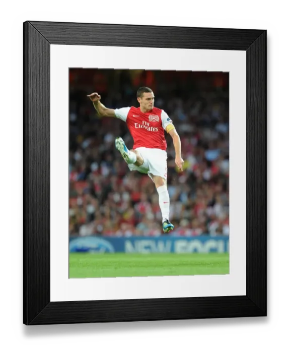 Framed Print : Thomas Vermaelen: Arsenal's Defensive Force in 2011-12 Udinese Clash (UEFA Champions League Play-Off)