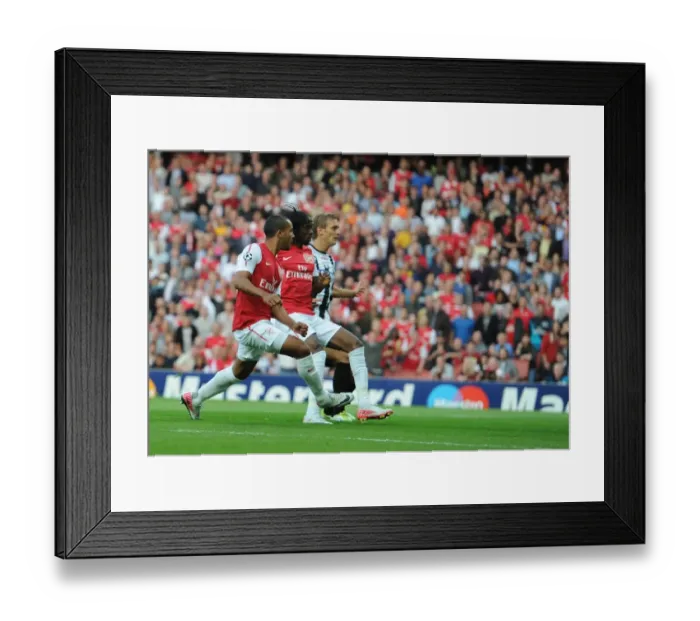 Framed Print : Theo Walcott's Stunner: Arsenal's Winning Goal Against Udinese in 2011-12 Champions League Play-Off