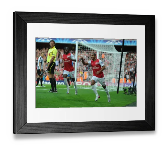 Framed Print : Arsenal's Walcott and Gervinho: Celebrating a Goal in the 2011-12 UEFA Champions League (vs Udinese) Framed Print : Arsenal's Walcott and Gervinho: Celebrating a Goal in the 2011-12 UEFA Champions League (vs Udinese)