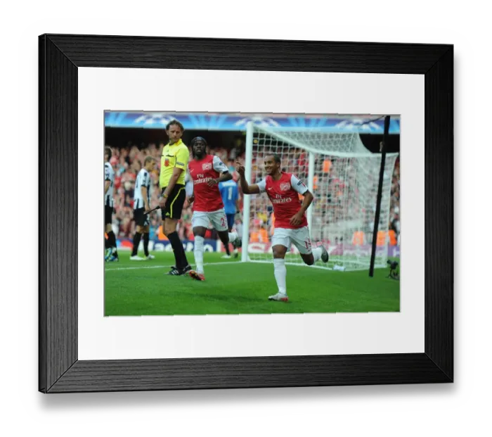Framed Print : Theo Walcott's Thrilling Goal: Arsenal's Champions League Triumph Over Udinese (2011-12)