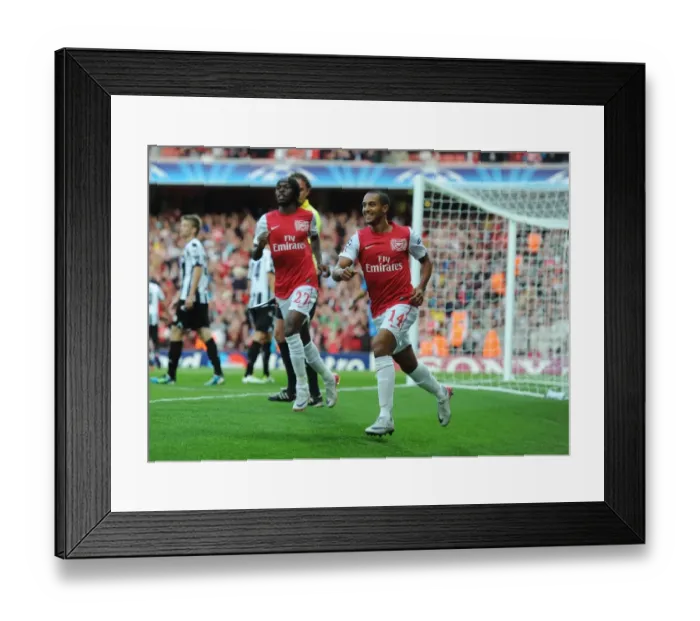 Framed Print : Theo Walcott's Thrilling Goal: Arsenal's Winning Moment in 2011-12 Champions League Play-Off vs Udinese Framed Print : Theo Walcott's Thrilling Goal: Arsenal's Winning Moment in 2011-12 Champions League Play-Off vs Udinese