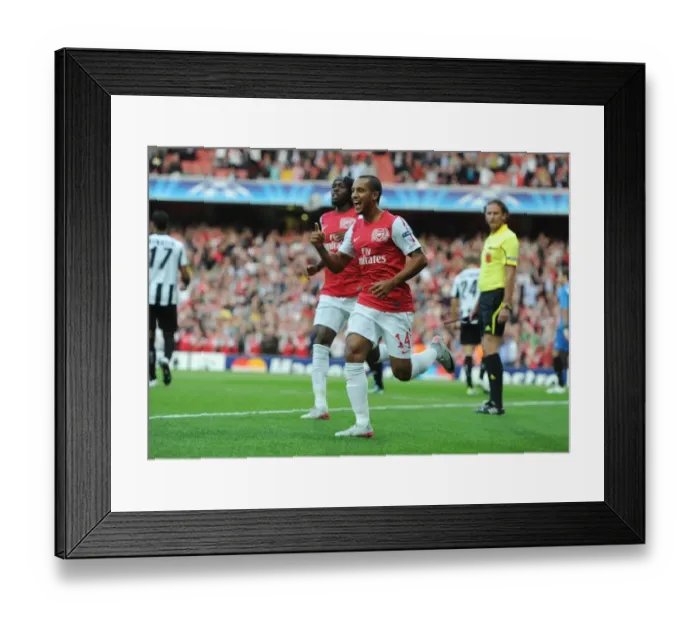 Framed Print : Theo Walcott's Thrilling Goal: Kickstarting Arsenal's Champions League Victory (2011-12)