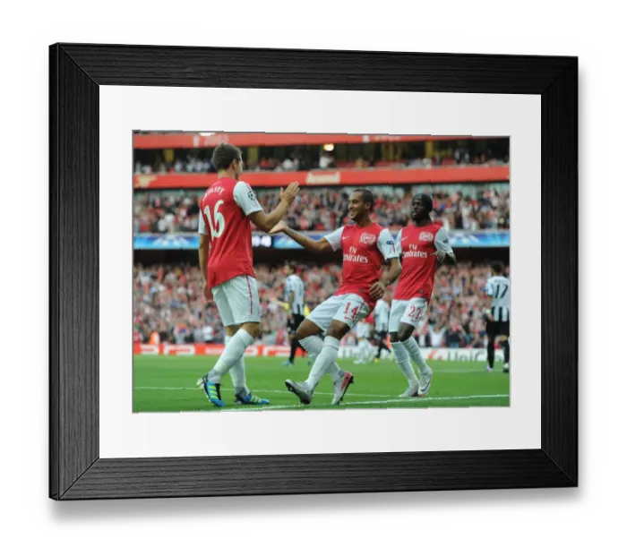 Framed Print : Arsenal Triumph: Walcott, Gervinho, Ramsey Celebrate Goal vs Udinese in 2011-12 Champions League Framed Print : Arsenal Triumph: Walcott, Gervinho, Ramsey Celebrate Goal vs Udinese in 2011-12 Champions League