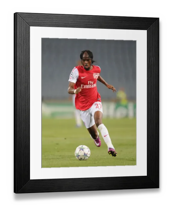 Framed Print : Gervinho in Action: Arsenal vs. Udinese, UEFA Champions League Play-Off, 2011