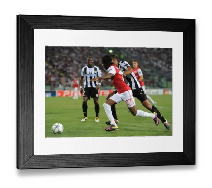 Framed Print : Gervinho vs. Pablo Armero: Battle at the Stadio Friuli - Udinese vs. Arsenal, UEFA Champions League Play-Off, 2011 Framed Print : Gervinho vs. Pablo Armero: Battle at the Stadio Friuli - Udinese vs. Arsenal, UEFA Champions League Play-Off, 2011