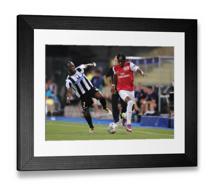 Framed Print : Gervinho vs. Emmanuel Badu: Battle in the UEFA Champions League Play-Offs (Udinese v Arsenal, 2011) Framed Print : Gervinho vs. Emmanuel Badu: Battle in the UEFA Champions League Play-Offs (Udinese v Arsenal, 2011)