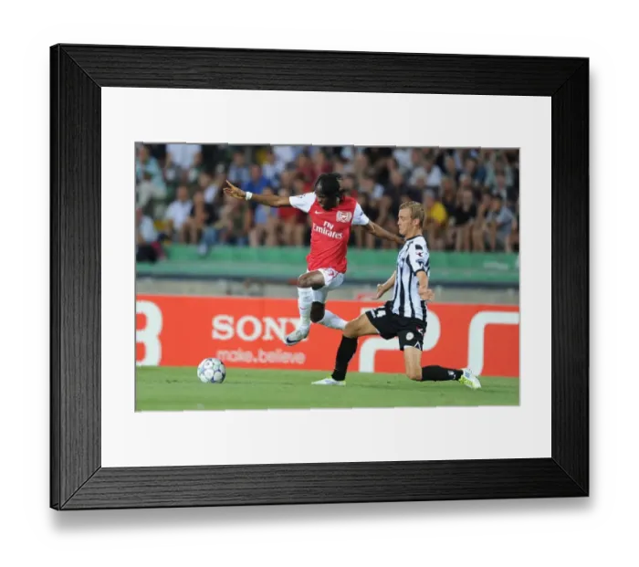Framed Print : Gervinho's Edge: Arsenal's Victory Over Ekstrand in the Udinese Clash (2011-12 UCL) Framed Print : Gervinho's Edge: Arsenal's Victory Over Ekstrand in the Udinese Clash (2011-12 UCL)