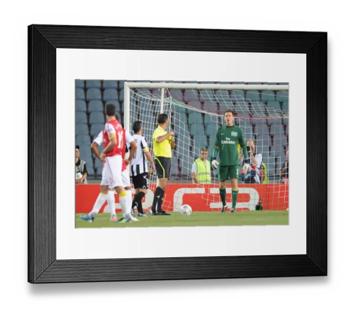 Framed Print : Arsenal's Szczesny Taunts Di Natale During Udinese Penalty in 2011 Champions League Clash Framed Print : Arsenal's Szczesny Taunts Di Natale During Udinese Penalty in 2011 Champions League Clash
