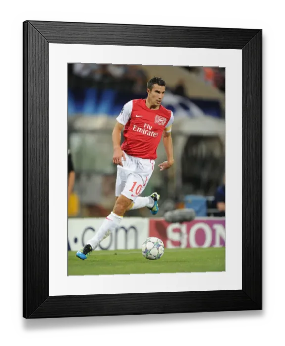 Framed Print : Robin van Persie in Action: Udinese Calcio vs. Arsenal FC, UEFA Champions League Play-Off, 2011