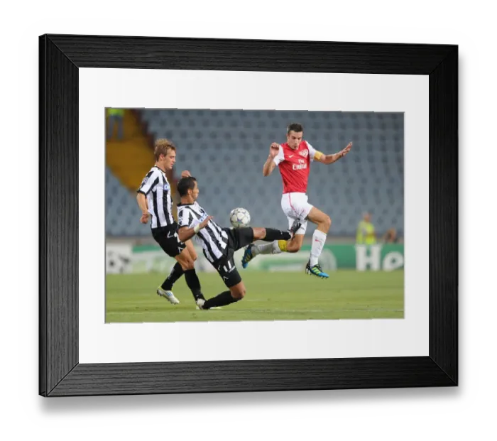 Framed Print : Robin van Persie vs Medhi Benatia: Clash in the UEFA Champions League Play-Offs (Udinese v Arsenal 2011-12)