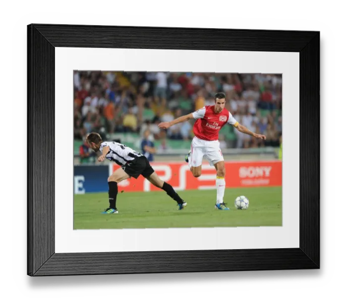 Framed Print : Robin van Persie Outmaneuvers Neuton: Arsenal's Star Forward in Action against Udinese (2011-12 UEFA Champions League) Framed Print : Robin van Persie Outmaneuvers Neuton: Arsenal's Star Forward in Action against Udinese (2011-12 UEFA Champions League)