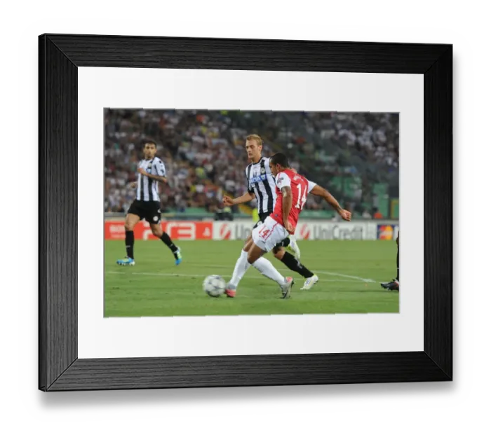 Framed Print : Theo Walcott's Brace: Arsenal's UEFA Champions League Victory over Udinese Calcio (2011)