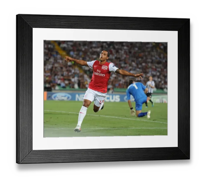 Framed Print : Theo Walcott's Double: Arsenal Secures UEFA Champions League Spot vs Udinese Calcio (2011) Framed Print : Theo Walcott's Double: Arsenal Secures UEFA Champions League Spot vs Udinese Calcio (2011)