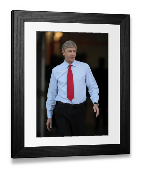 Framed Print : Arsene Wenger: Arsenal Manager Ahead of Udinese Clash in UEFA Champions League Play-Offs (August 2011)
