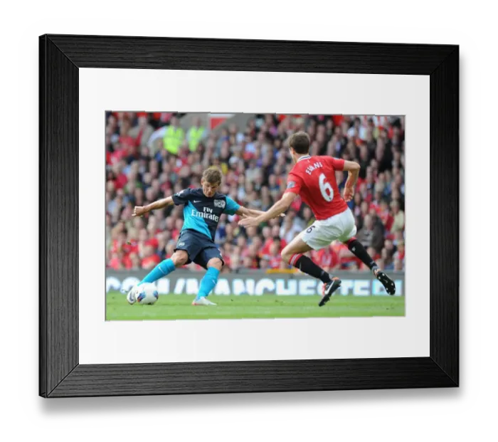 Framed Print : Arshavin Outmaneuvers Evans: Manchester United vs Arsenal, Premier League 2011-12 Framed Print : Arshavin Outmaneuvers Evans: Manchester United vs Arsenal, Premier League 2011-12