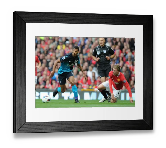 Framed Print : Armand Traore vs. Phil Jones: Manchester United vs. Arsenal Clash (2011-12)