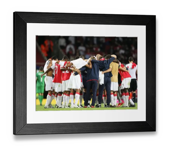 Framed Print : Arsenal Triumphs Over Sparta Prague: Players Celebrate 3-0 Champions League Victory