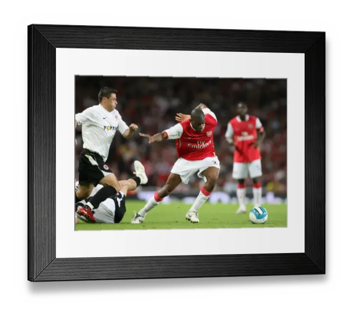Framed Print : Abu Diaby and Marek Kulic Clash in Arsenal's 3-0 Victory over Sparta Prague in the UEFA Champions League