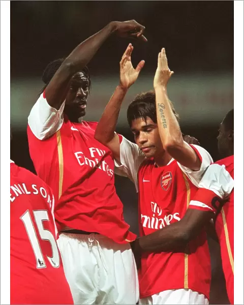 Eduardo celebrates scoring Arsenals 3rd goal with Emmanuel Adebayor