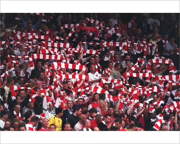 Arsenal fans with their scarves