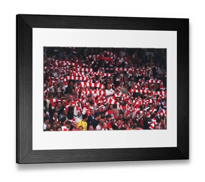 Framed Print : Arsenal fans with their scarves