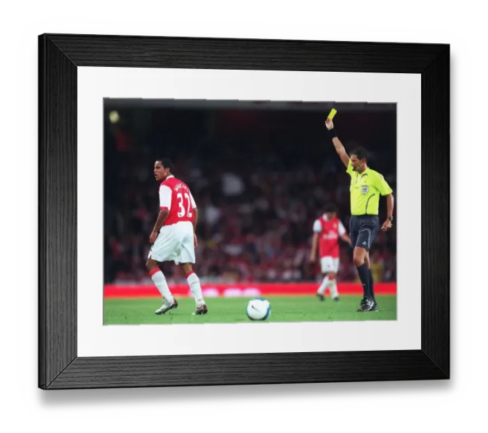 Framed Print : Theo Walcott (Arsenal) is shown the Yellow card by the referee
