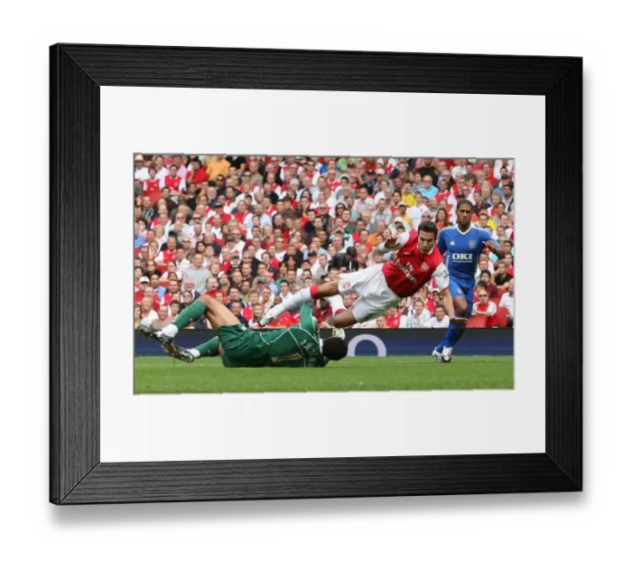 Framed Print : Robin van Persie (Arsenal) is fouled by David James (Portsmouth) for Arsenals penalty
