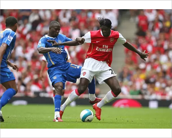 Emmanuel Adebayor (Arsenal) Sulley Muntari (Portsmouth)
