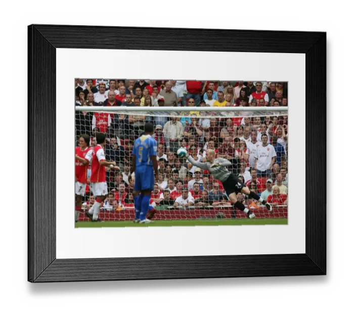 Framed Print : Manuel Almunia (Arsenal) dives to save a free kick Framed Print : Manuel Almunia (Arsenal) dives to save a free kick