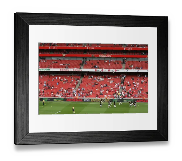Framed Print : Arsenal's Triumphant Warm-Up: 3-1 Victory over Portsmouth in the Premier League
