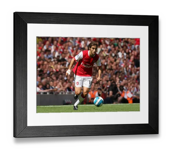 Framed Print : Arsenal's Triumph: Mathieu Flamini Leads the Gunners to a 3-1 Victory Over Portsmouth in the Barclays Premier League (September 2, 2007) Framed Print : Arsenal's Triumph: Mathieu Flamini Leads the Gunners to a 3-1 Victory Over Portsmouth in the Barclays Premier League (September 2, 2007)