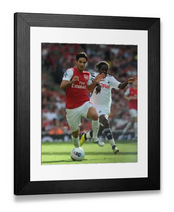 Framed Print : Mikel Arteta (Arsenal) Nathan Dyer (Swansea). Arsenal 1: 0 Swansea City