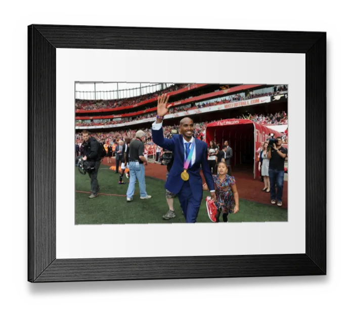 Framed Print : Mo Farah's Victory Wave: Arsenal Leads Swansea City 1-0 in Premier League