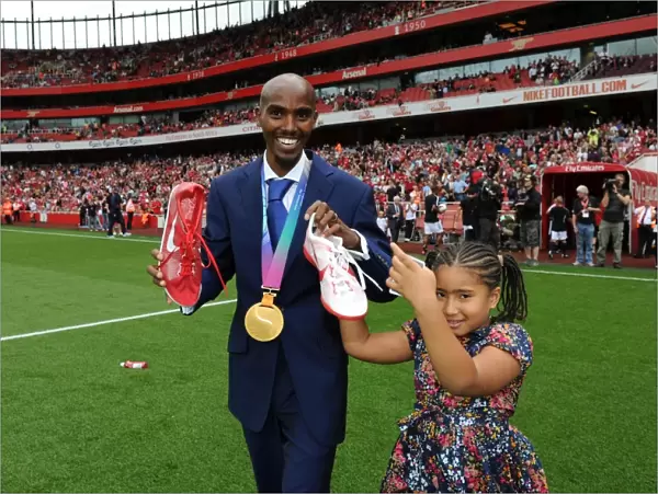 Mo Farah, Arsenal Supporter and 5000m World Champion, Celebrates Victory at Emirates Stadium as Arsenal Triumphs Over Swansea City