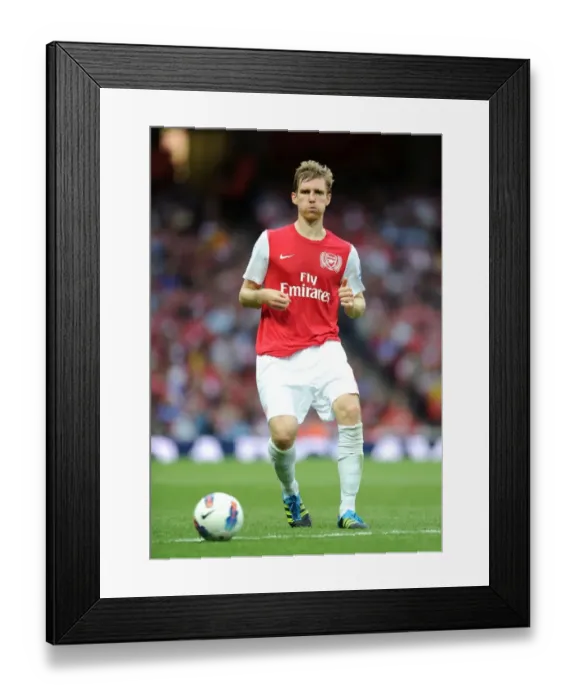 Framed Print : Arsenal's Per Mertesacker Scores the Winner: Arsenal 1-0 Swansea City, Premier League 2011-12