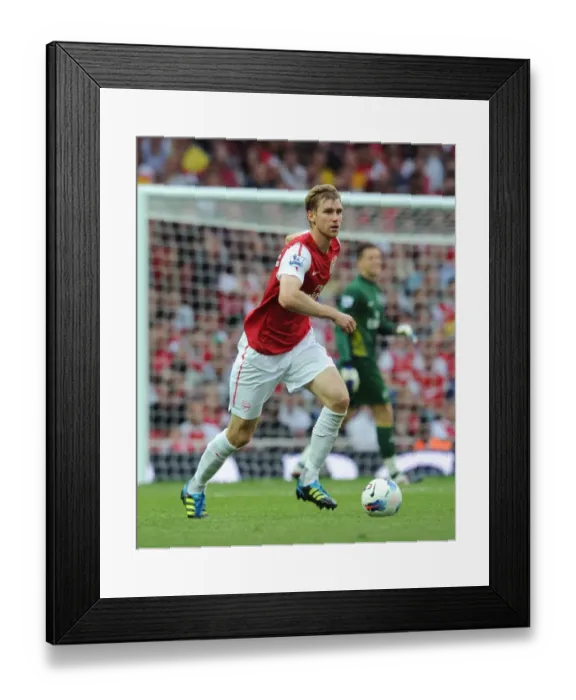 Framed Print : Per Mertesacker's Game-Winning Goal: Arsenal's 1-0 Triumph Over Swansea City, Premier League 2011-12 Framed Print : Per Mertesacker's Game-Winning Goal: Arsenal's 1-0 Triumph Over Swansea City, Premier League 2011-12