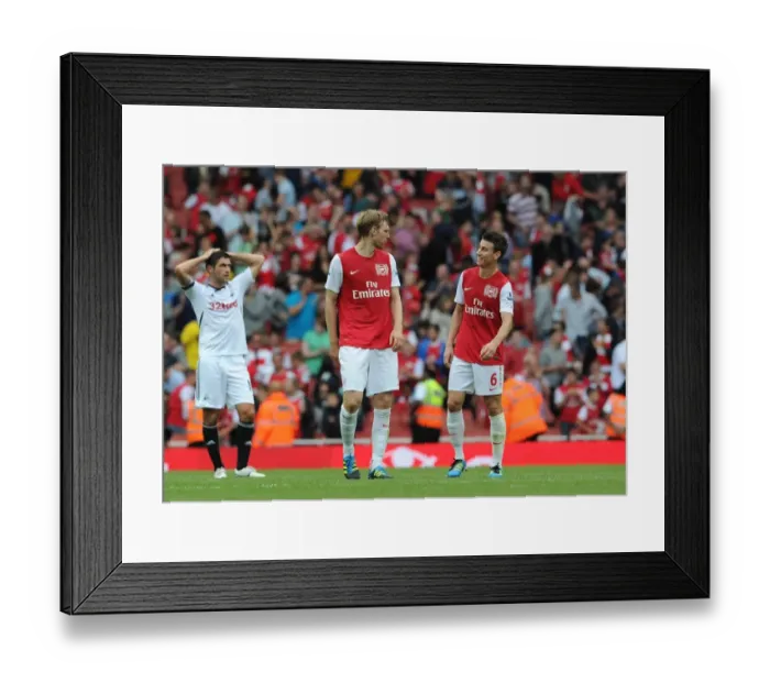 Framed Print : Per Mertesacker and Laurent Koscielny (Arsenal) chat after the match. Arsenal 1: 0 Swansea City Framed Print : Per Mertesacker and Laurent Koscielny (Arsenal) chat after the match. Arsenal 1: 0 Swansea City