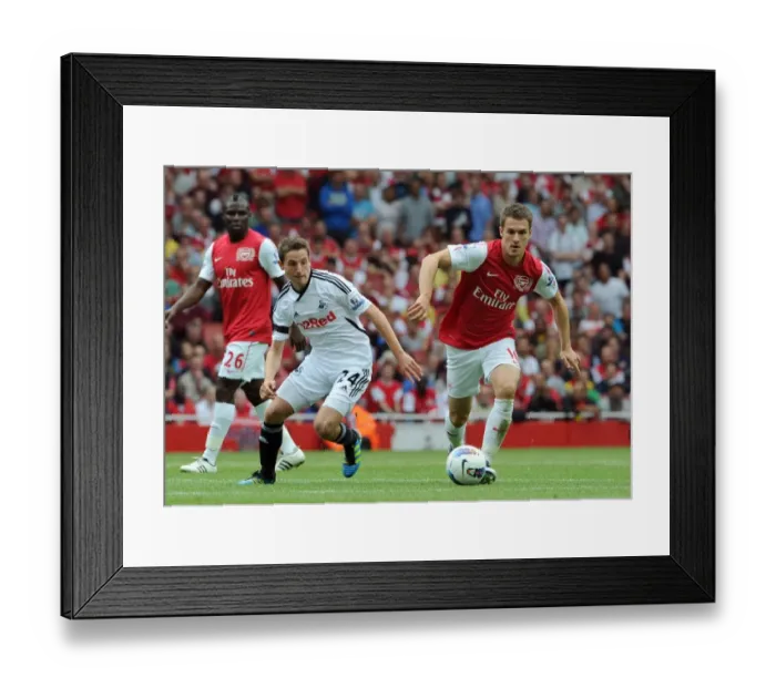 Framed Print : Ramsey's Strike: Arsenal's 1-0 Victory Over Swansea City in the Premier League, 10 / 9 / 11