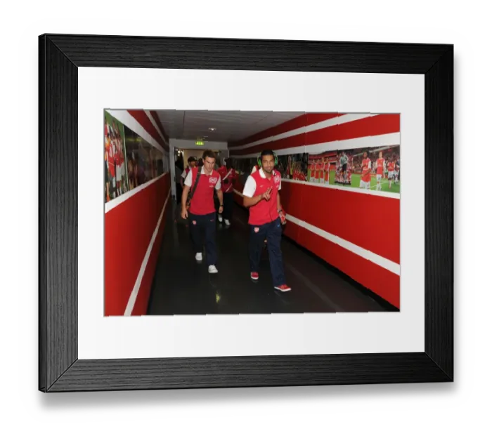 Framed Print : Arsenal's Ramsey and Santos Arrive: Arsenal Leads Swansea 1-0 in Premier League Showdown at Emirates Stadium Framed Print : Arsenal's Ramsey and Santos Arrive: Arsenal Leads Swansea 1-0 in Premier League Showdown at Emirates Stadium