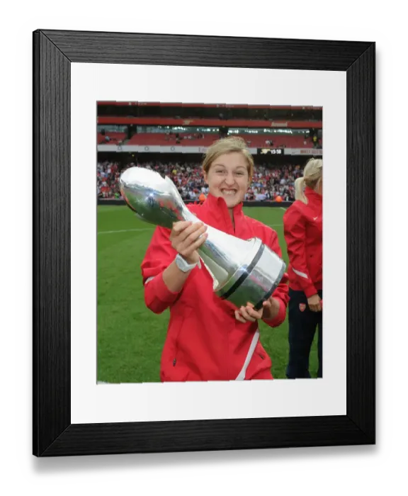 Framed Print : Arsenal's Ellen White Celebrates with WSL Trophy Amidst Arsenal's 1:0 Lead over Swansea City in the Premier League, Emirates Stadium (2011) Framed Print : Arsenal's Ellen White Celebrates with WSL Trophy Amidst Arsenal's 1:0 Lead over Swansea City in the Premier League, Emirates Stadium (2011)