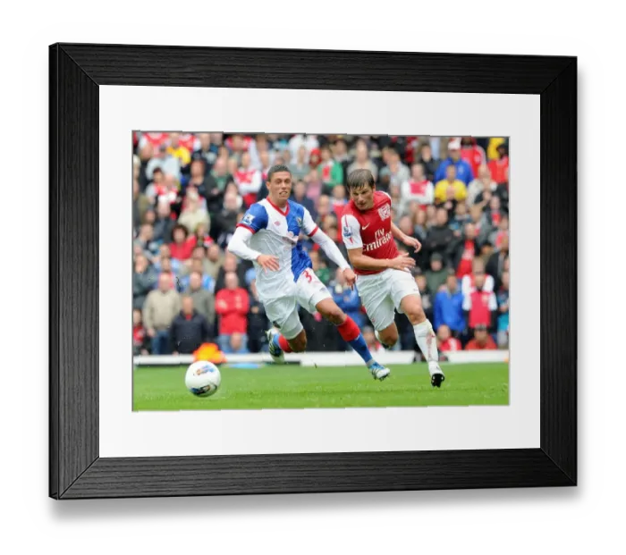 Framed Print : Arshavin vs Lowe: Thrilling 4-3 Barclays Premier League Clash between Blackburn Rovers and Arsenal, September 17, 2011 Framed Print : Arshavin vs Lowe: Thrilling 4-3 Barclays Premier League Clash between Blackburn Rovers and Arsenal, September 17, 2011