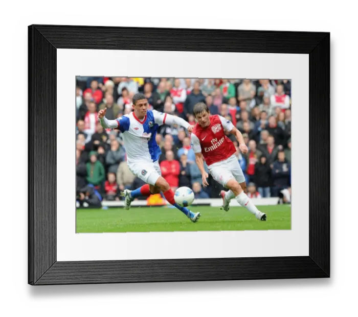 Framed Print : Thrilling 4-3 Arsenal Victory: Arshavin vs Lowe Showdown in the Premier League Clash between Arsenal and Blackburn Rovers, September 17, 2011