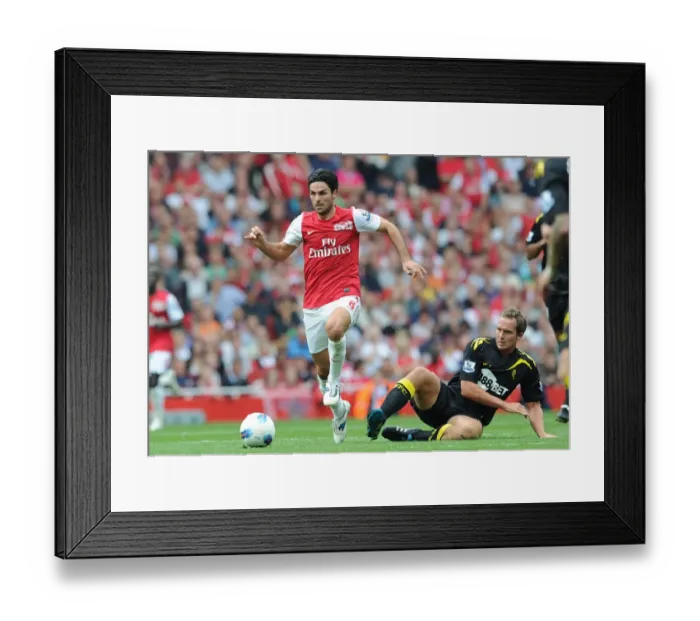 Framed Print : Arsenal's Mikel Arteta Outmaneuvers Bolton's Kevin Davies in 2011-12 Premier League Clash Framed Print : Arsenal's Mikel Arteta Outmaneuvers Bolton's Kevin Davies in 2011-12 Premier League Clash