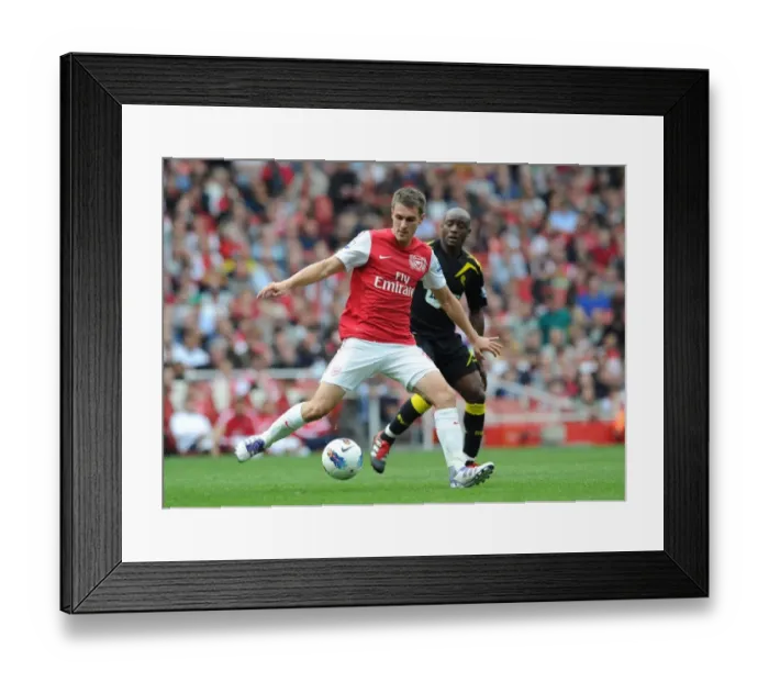Framed Print : Aaron Ramsey Outmaneuvers Nigel Reo-Coker: Arsenal vs Bolton Wanderers, 2011-12 Premier League Framed Print : Aaron Ramsey Outmaneuvers Nigel Reo-Coker: Arsenal vs Bolton Wanderers, 2011-12 Premier League