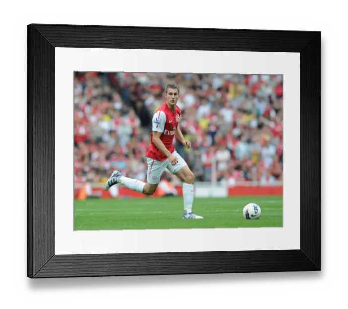 Framed Print : Aaron Ramsey in Action: Arsenal vs Bolton Wanderers, Premier League 2011-12 Framed Print : Aaron Ramsey in Action: Arsenal vs Bolton Wanderers, Premier League 2011-12