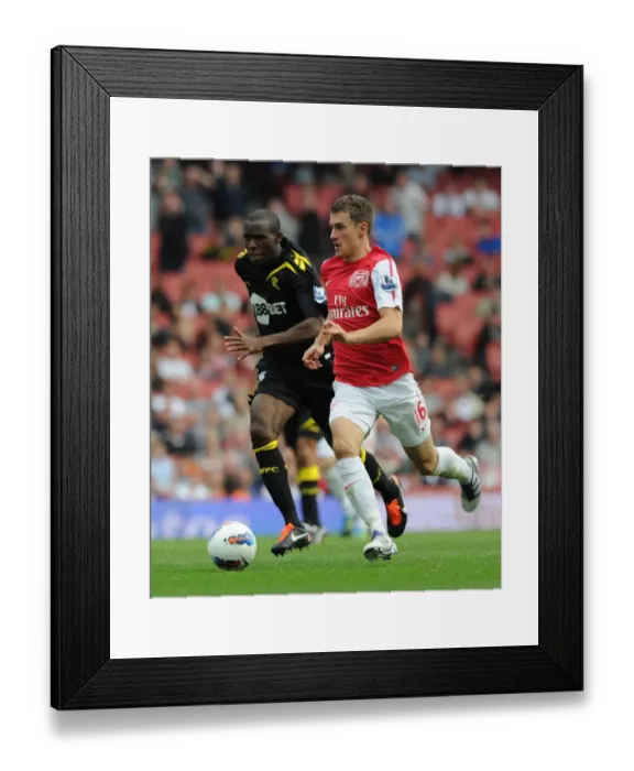 Framed Print : Aaron Ramsey vs. Fabrice Muamba: Clash at Emirates Stadium, Arsenal v Bolton Wanderers (2011-12)
