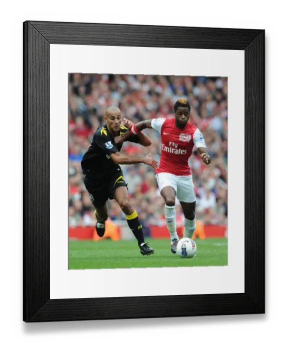 Framed Print : Alex Song Outmaneuvers Darren Pratley: Arsenal vs. Bolton Wanderers, 2011-12 Premier League