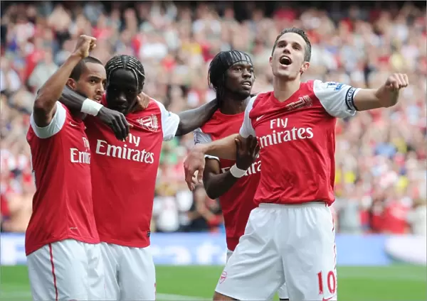Arsenal's Star Strikers: Van Persie, Walcott, Sagna, and Gervinho Celebrate Goal vs. Bolton Wanderers (2011-12)