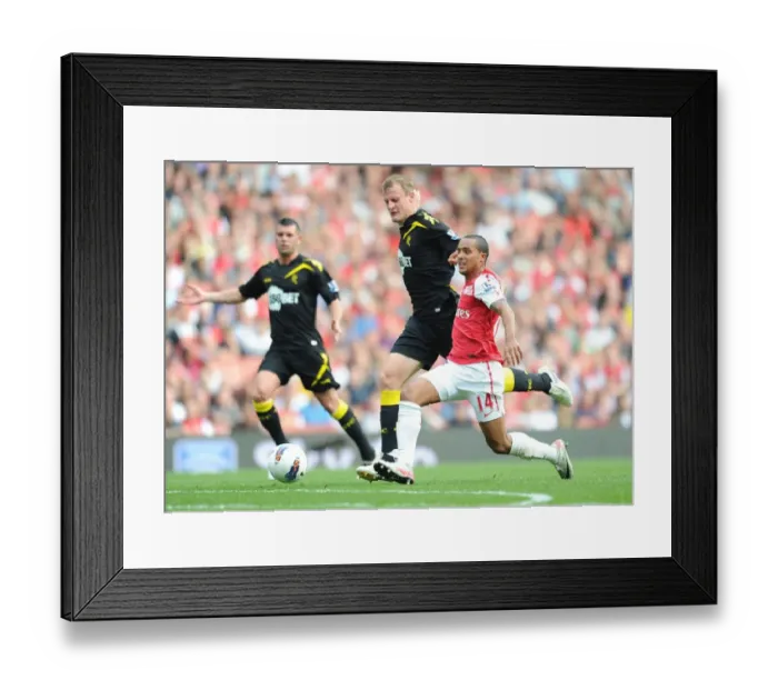 Framed Print : Theo Walcott vs. David Wheater: Red Card Drama at Arsenal vs. Bolton Wanderers (2011-12)